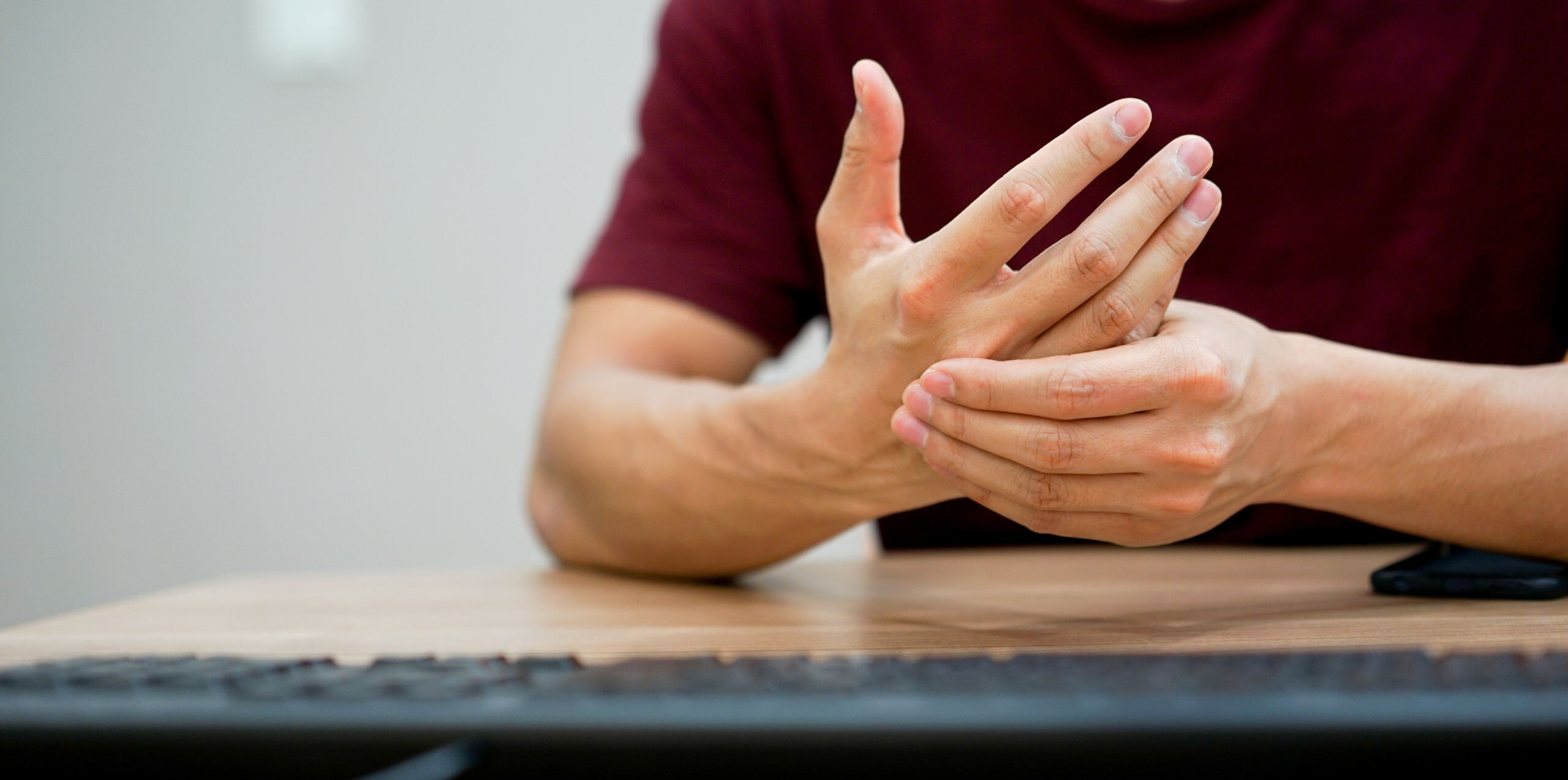 What causes carpal tunnel?